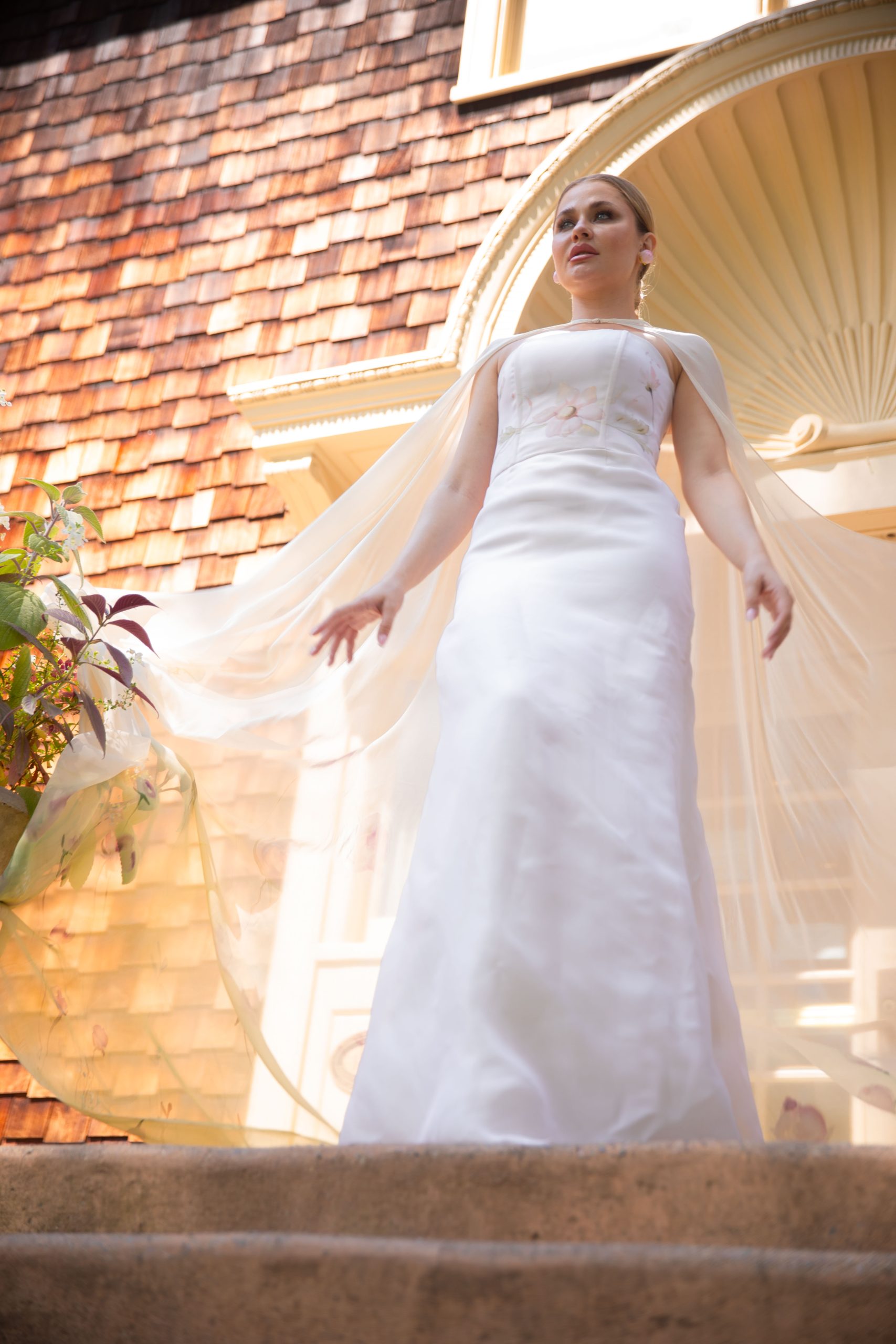 flowing silk bridal cape with hand painted floral details