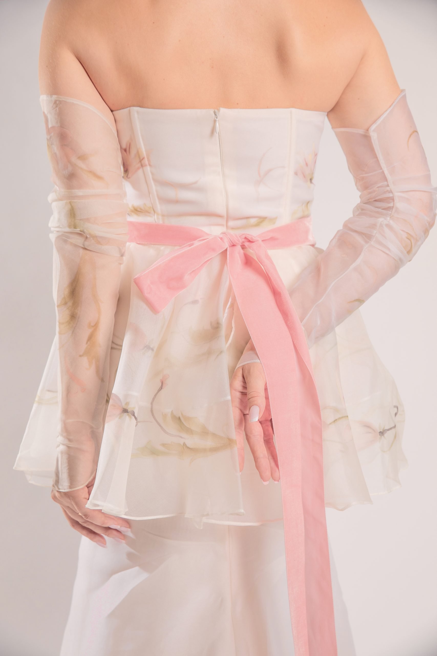 details of silk organza hand painted ruffles and removable sleeves