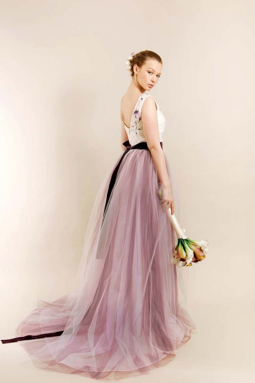 Artistic tulle bridal dress with hand painted silk gazar bodice and velvet bow