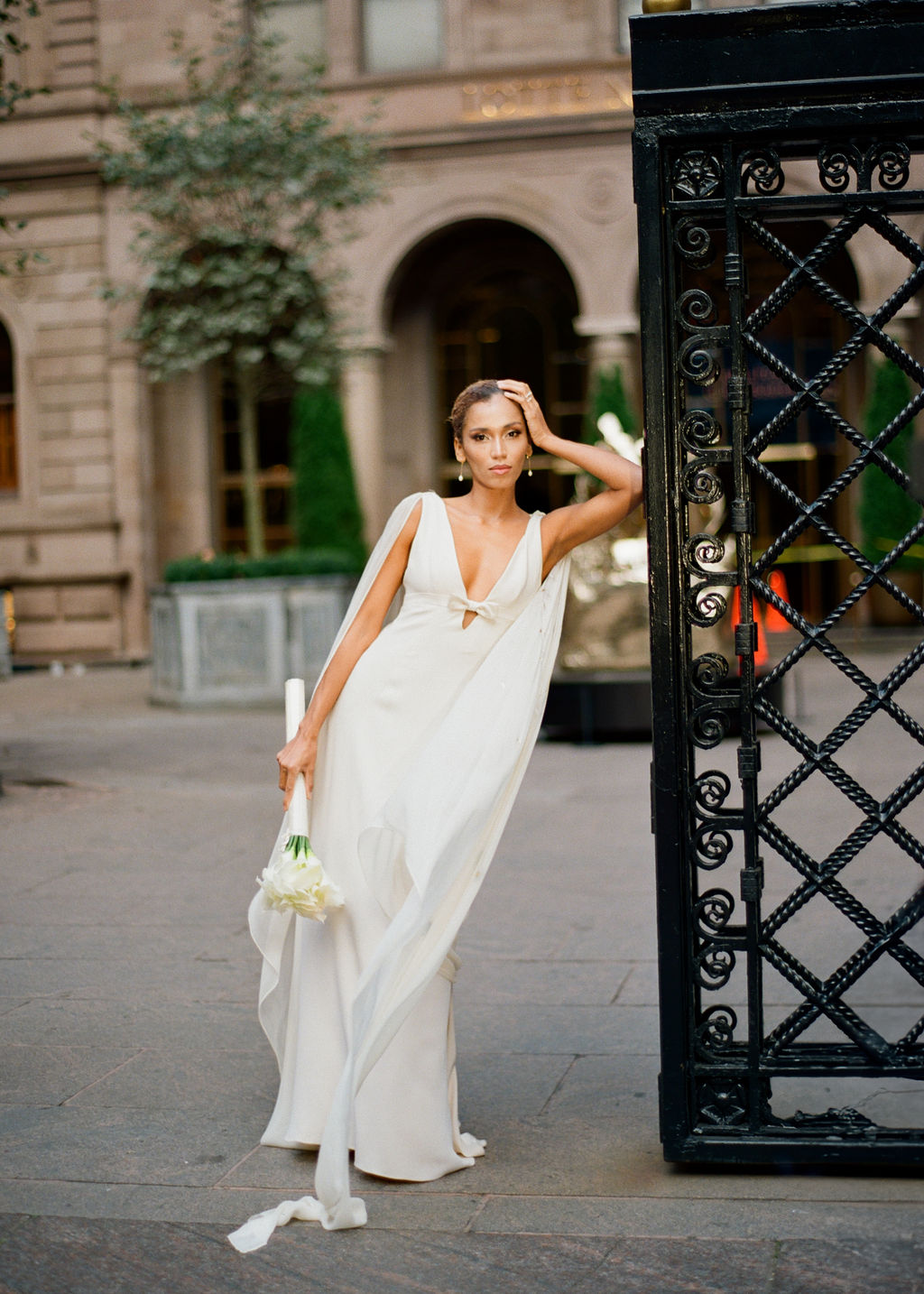 Artistic A-line wedding dress with hand painted poppies and flowing back sash