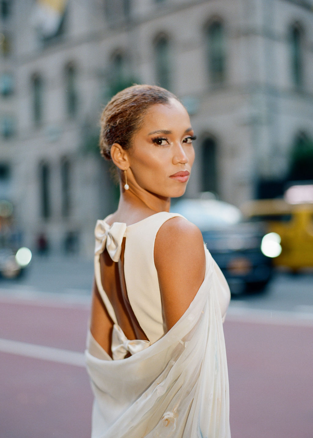 Luxury couture bridal gown with detachable draped sash and hand painted poppies