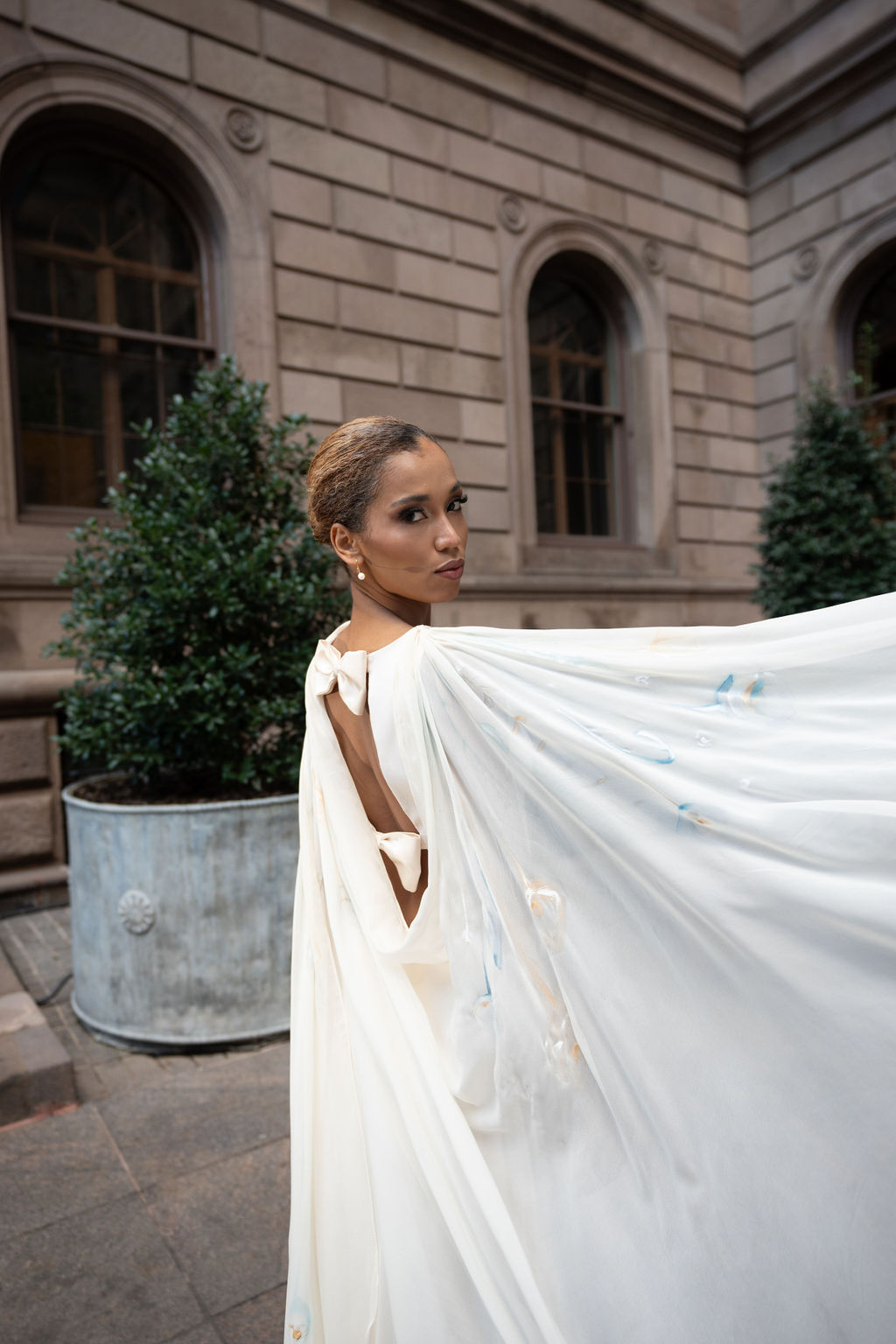 crepe back satin A-line bridal dress with hand painted poppy sash