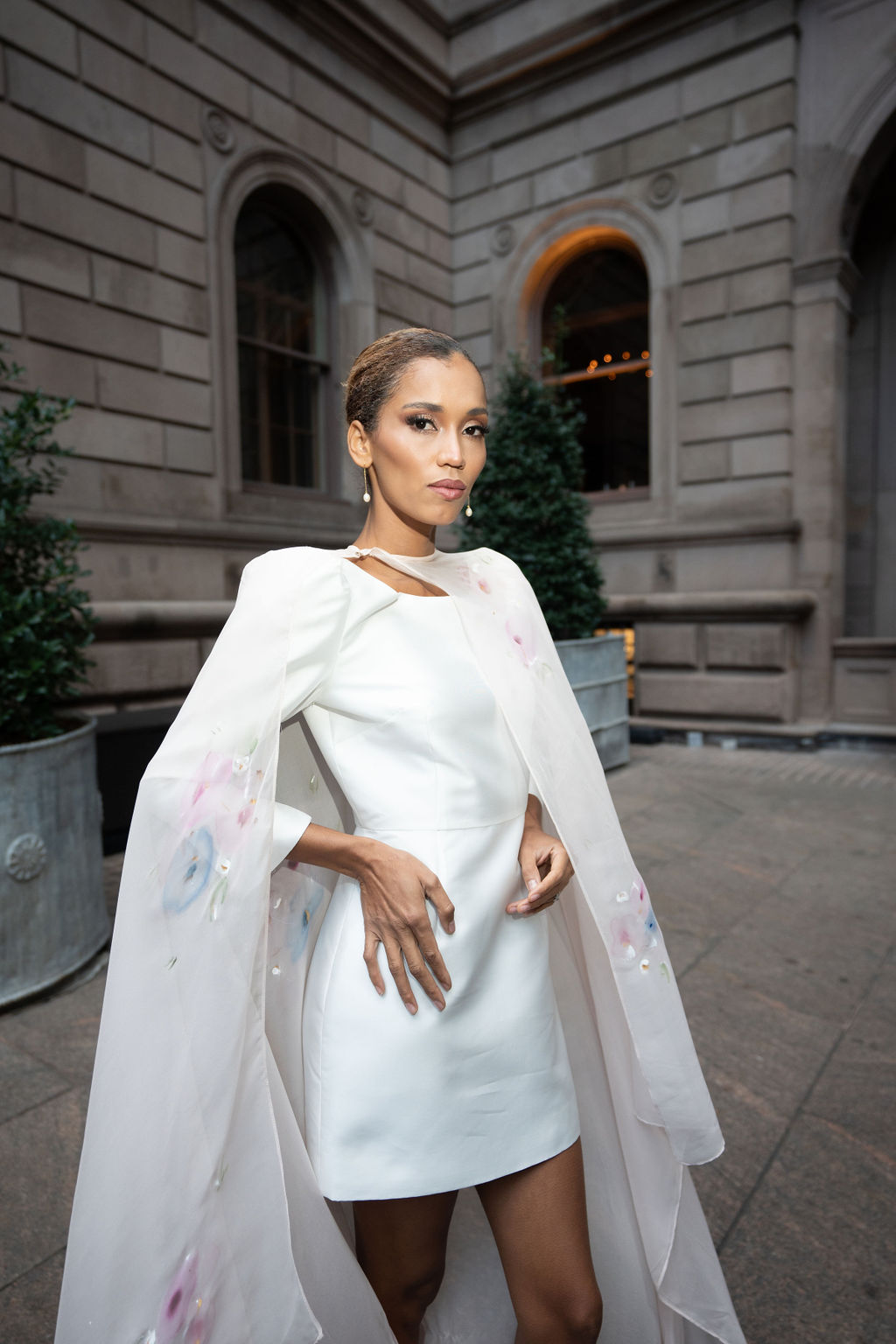 Luxury blush chiffon wedding cape with hand painted floral detailing