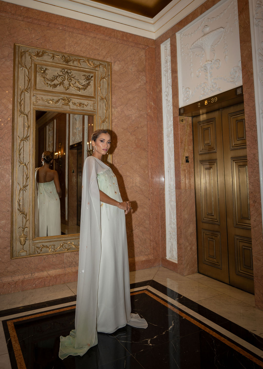 Silk column wedding dress with hand painted poppy design in shades of green