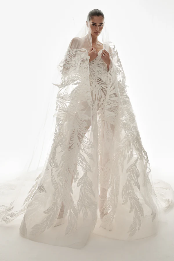 textured tulle wedding dress in white by designer Monique Lhuillier