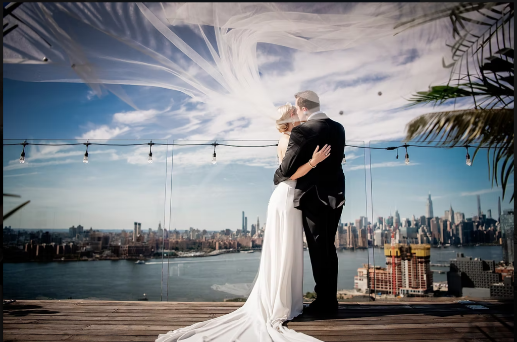 bride and groom hugging with beautiful skyline at the back