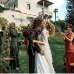 happy couple kissing on their luxury destination wedding
